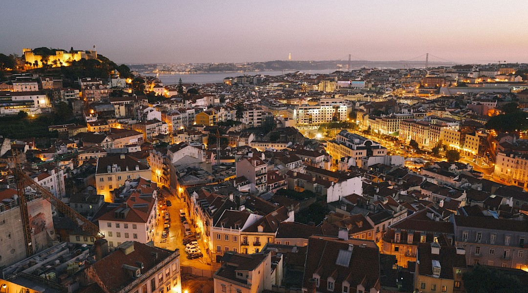 Lisbon at night, Portugal. Unsplash:Andreas Brucker