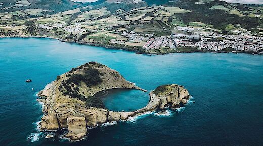Swimming in a volcanic crater, Azores, Portugal. Unsplash:Ferdinand Stohr