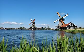The windmills of Zaanse Schans, Holland. Unsplash@Simon Wiedensohler