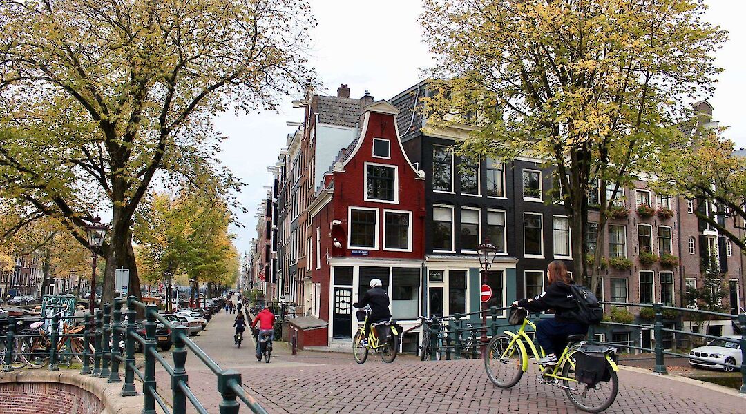 Bike tour over a bridge in Amsterdam, Holland. CC:TO