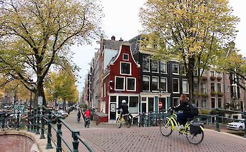 Bike tour over a bridge in Amsterdam, Holland. CC:TO