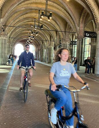 Cycling through a tunnel, Amsterdam bike tour, Holland. CC:TO