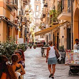 Street cafe, Palermo, Italy. Unsplash:Whos Denilo