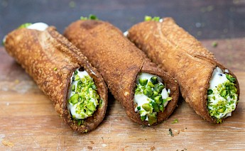 Cannoli, famous Sicilian dessert with ricotta cheese. Unsplash:Amirali Mirhashemian