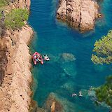 Swimming in deep blue waters in Sant Feliu de Guíxols, Spain. Unsplash:Unexpected Catalonia