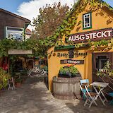 A typical Heurigen-Restaurant - a small Viennese pub specializing in wines. CC:Otto Domes
