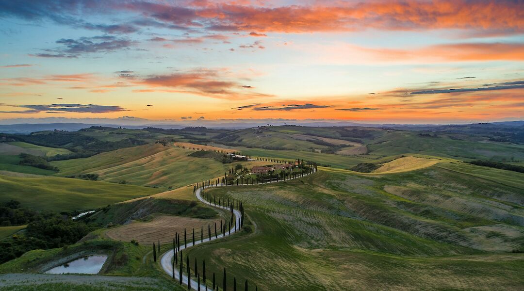 Cycling through Tuscany. unsplash:LucaMicheli