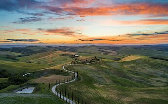 Cycling through Tuscany. unsplash:LucaMicheli