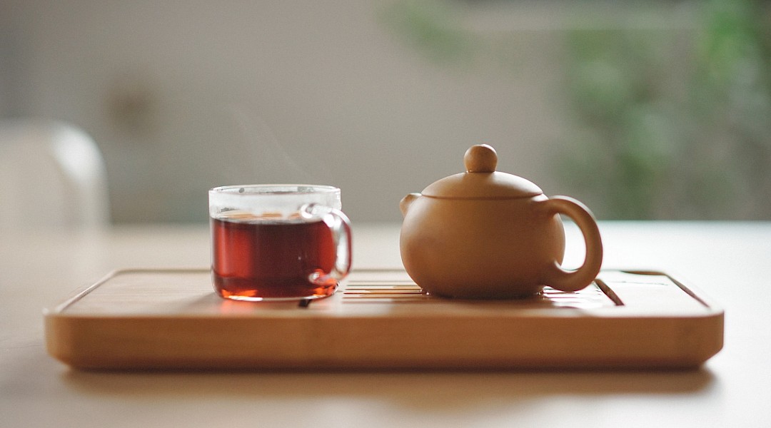 Tea served in a glass tea cup. Manki Kim@Unsplash
