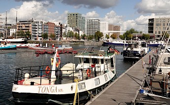Boats tied at the dock, Antwerp. Paul Teysen@Unsplash
