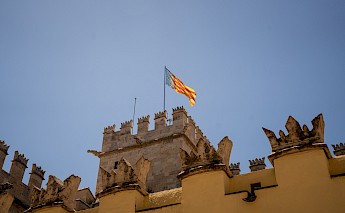 Valencia Flag in Lonja de la Seda in Valencia, Spain. Northleg Official@Unsplash