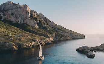 Sailboat on tranquil waters, Marseille, France. Mathieu da Cruz@Unsplash
