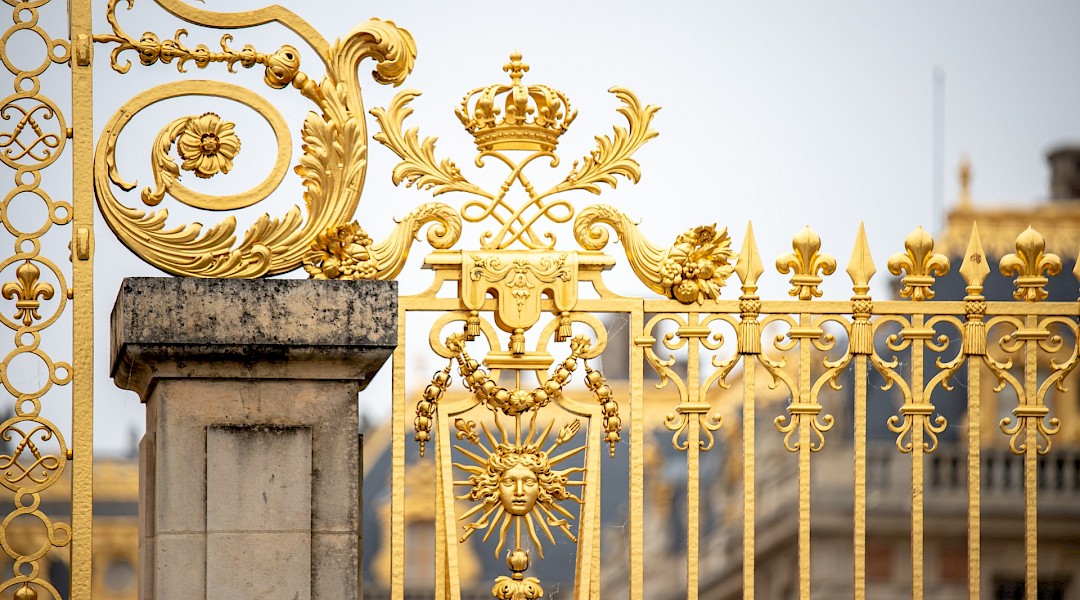 Detail from the King's Golden Gate, also known as Honour Gate, at the main entrance, Versailles. Stephanie Leblanc@Unsplash