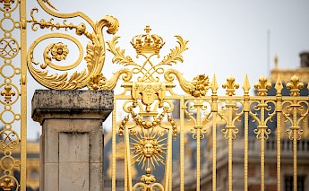 Detail from the King's Golden Gate, also known as Honour Gate, at the main entrance, Versailles. Stephanie Leblanc@Unsplash