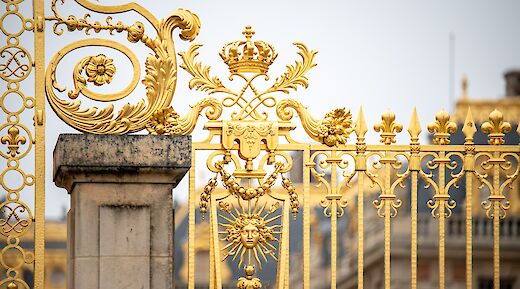 Detail from the King's Golden Gate, also known as Honour Gate, at the main entrance, Versailles. Stephanie Leblanc@Unsplash