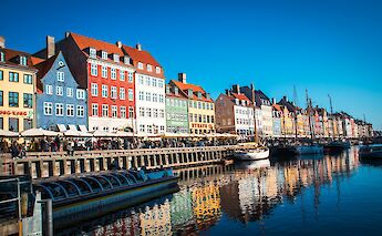 Reflections on the canal in Copenhagen, Denmark. Charly Nguyen@Unsplash