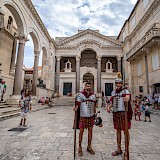 Diocletian's Palace with men dressed as Roman guards. Mana5280@Unsplash