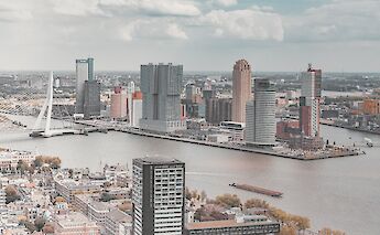 City's skyline under the white and blue sky - Rotterdam, Netherlands. Stephan@Unsplash