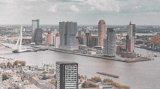 City's skyline under the white and blue sky - Rotterdam, Netherlands. Stephan@Unsplash