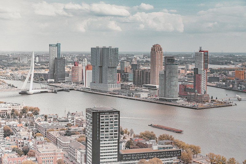 City's skyline under the white and blue sky - Rotterdam, Netherlands. Stephan@Unsplash
