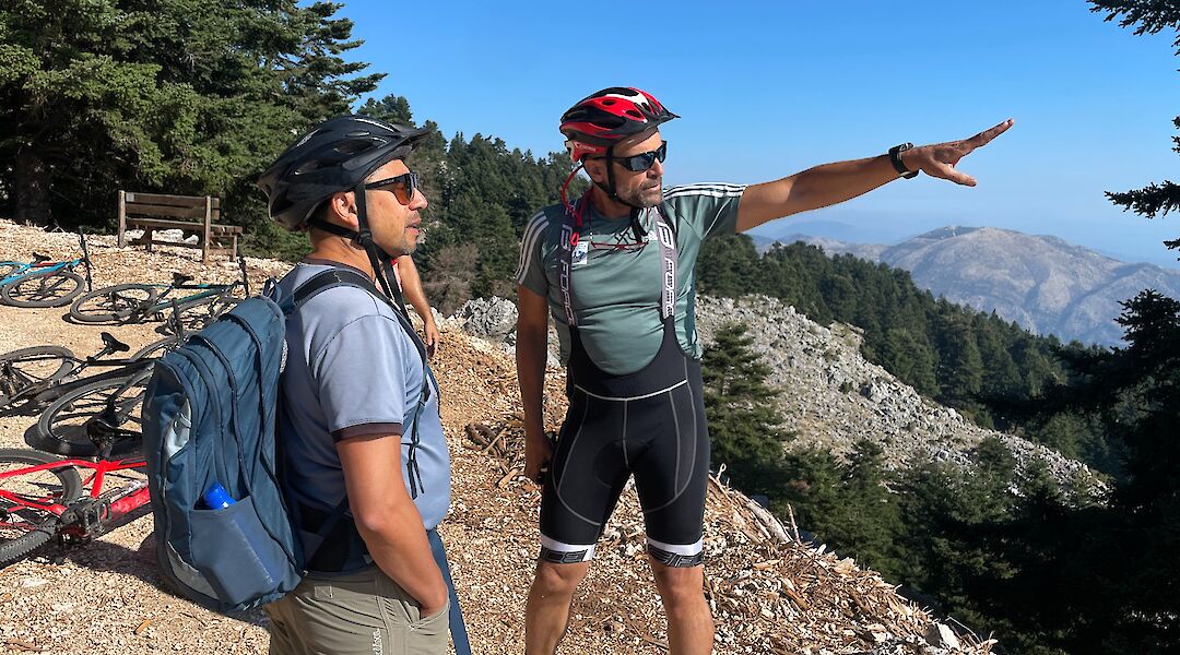 Tour guide pointing out the sights, Mount Ainos, Kefalonia, Greece. CC:TO