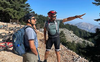Tour guide pointing out the sights, Mount Ainos, Kefalonia, Greece. CC:TO