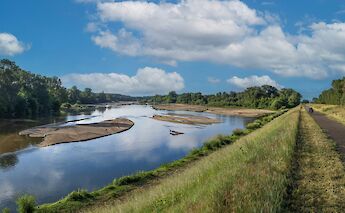 Clouds reflecting in the river in the Loire Valley, France. Free Nomad@Unsplash
