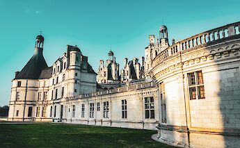 Sunlight on Chambord Castle, France. Antonin Carvalho@Unsplash