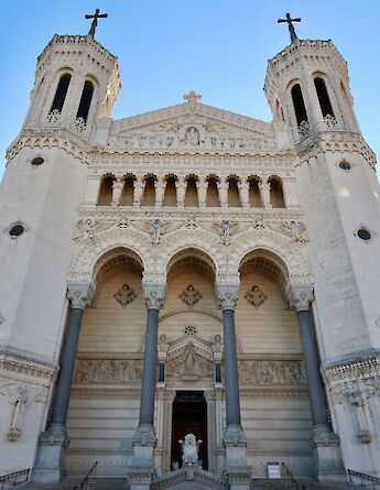 Standing at the entrance to the Basilica of Fourvière, Lyon. Unsplash@Julio Hernandez