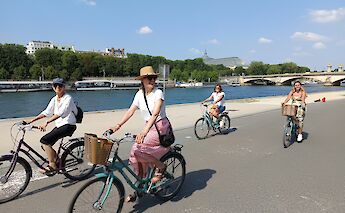 Cycling along the Seine, Paris bike tour, France. CC:TO