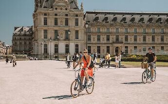 Cycling towards the camera, Paris bike tour, France. CC:TO