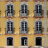 Beautiful yellow house along Alfama, Lisbon, Portugal. Thomas Peham@unsplash