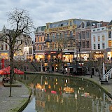 Dusk, shops along the Utrecht Canal lighting up, Utrecht, Holland. Martin Woortman@Unsplash