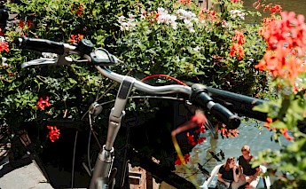 View from above while on a bike, somewhere in Utrecht, Holland. Verhalenhuys@Unsplash