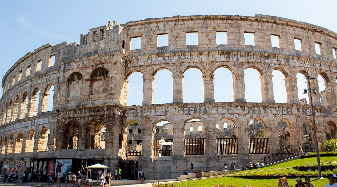 Pula Arena, is the only remaining Roman amphitheatre to have four side towers entirely preserved. It was constructed between 27 BC and AD 68, Pula, Croatia. Niels Bosman@Unsplash