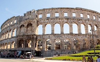 Pula Arena, is the only remaining Roman amphitheatre to have four side towers entirely preserved. It was constructed between 27 BC and AD 68, Pula, Croatia. Niels Bosman@Unsplash