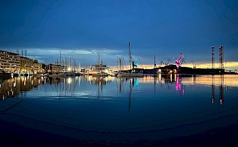 Sundown showing illuminated cranes, Pula, Croatia. James Qualtrough ??@Unsplash