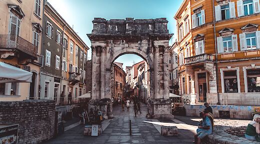 Old and new architecture meeting on the streets of Old Town Pula, Croatia. Nick Kane@Unsplash
