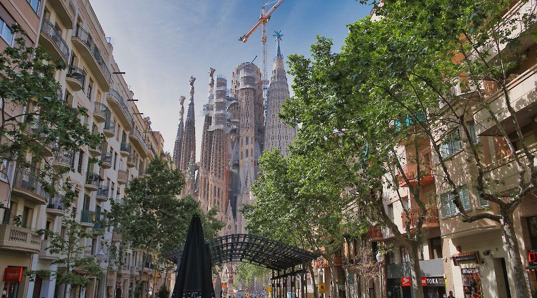 La Sagrada Familia, viewed from the streets of Barcelona, Spain. Yu@unsplash