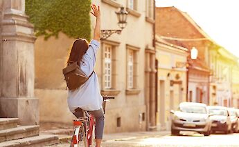 Cycling along a street. Getty Images@Unsplash