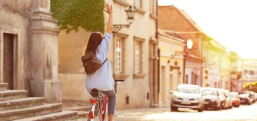 Cycling along a street. Getty Images@Unsplash