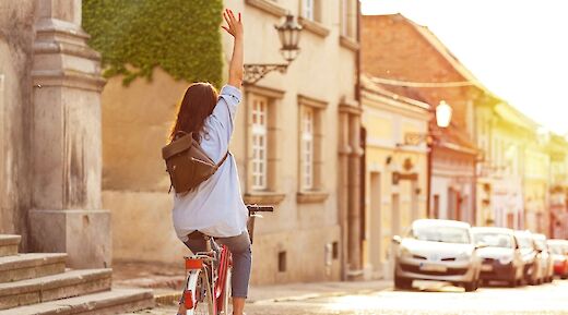 Cycling along a street. Getty Images@Unsplash