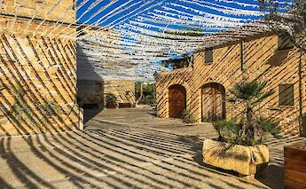 Festive decor hanging, Old town square, Palma de Mallorca, Spain. Malte@Unsplash