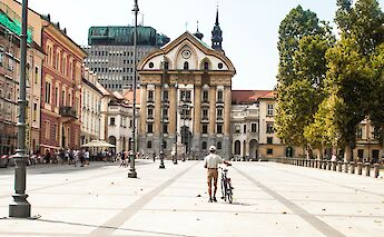 Biker and his bike, Congress square, Ljubljana, Slovenia. Bram van Geerenstein@Unsplash