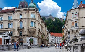 People walking along the streets of Old Town, Ljubljana, Slovenia. Eugene Kuznetsov@Unsplash