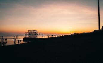 Old Pier at sunset, Brighton, Sussex, England. Ben Collins@Unsplash