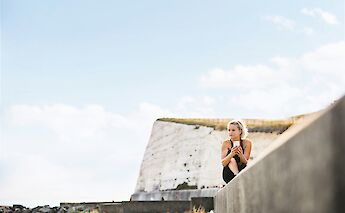 Sitting on a wall along the Undercliff Path, Brighton, Sussex, England. Getty Images@Unsplash