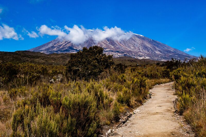 Clouds fronting Mount Kilimanjaro, Kilimanjaro, Tanzania. Crispin Jones@Unsplash