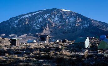 Tents and trekkers on Mount Kilimanjaro, Tanzania. Daniel Vargas@Unsplash