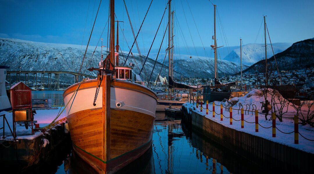 Boats anchored at the hardbor, Tromso, Norway. Vidar Nordli Mathisen@Unsplash